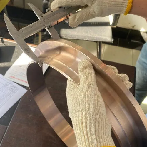 Caliper measurement of a copper nickel flange